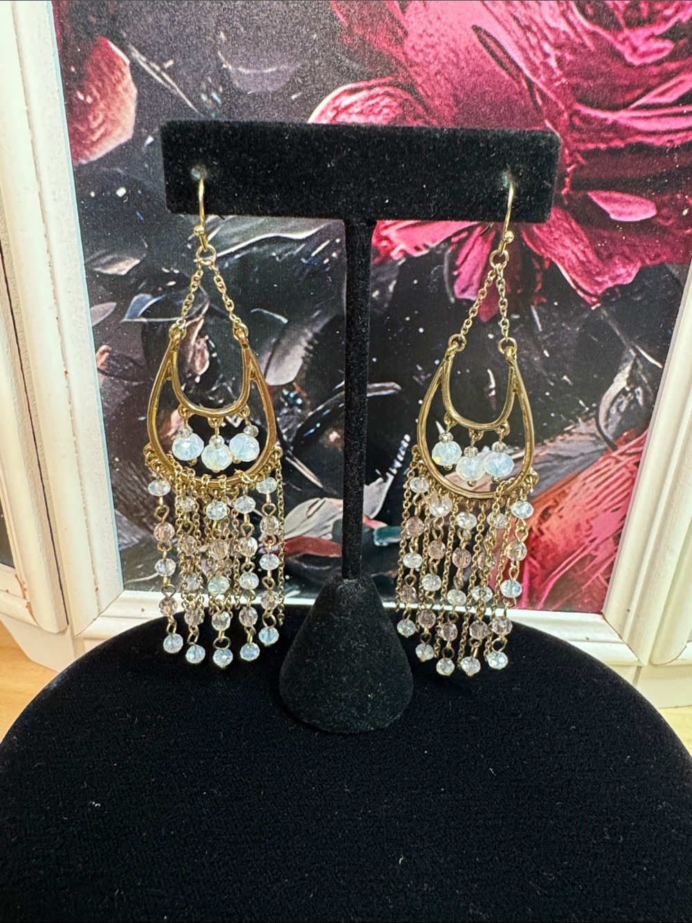 Goldtone iridescent pale blue chandelier earrings